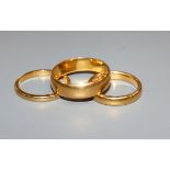Three assorted 22ct. gold wedding rings, 12.6 grams.