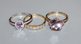 An 18ct gold 7-stone diamond ring, an 18ct white gold, amethyst and diamond ring and a 9ct gold pale