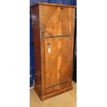 An Eastern hardwood cupboard, lancet shaped door enclosing shelves H.145cm