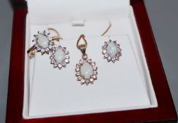 A modern suite of 9ct gold, white opal and pink sapphire jewellery, comprising, a ring, pair of