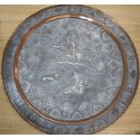 A Persian tinned copper charger diameter 58cm