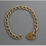 A 9ct gold curb link bracelet, approx. 17cm, 14 grams.