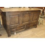 An 18th century oak mule chest W.132cm