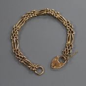 A 9ct yellow metal fancy gatelink bracelet, 10 grams.