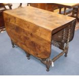 An 18th century oak gateleg dining table