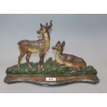 A cast iron 'deer' door stop height 20cm