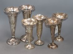 Three assorted pairs of early 20th century silver posy vases, including Mappin & Webb and