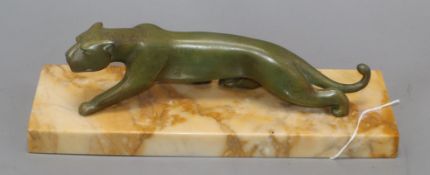 An Art Deco spelter model of a Panther, on a marble base length 30cm