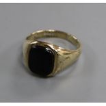 A 9ct gold and black onyx signet ring, size T