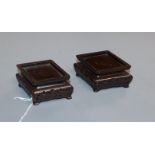 A pair of Chinese rosewood and silver wire lozenge shaped stands Provenance - The owner and her