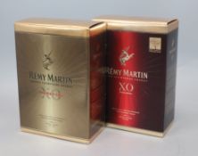 A bottle of Remy Martin Premier Cru XO and a bottle of Remy Martin XO Excellence