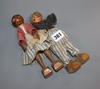 Two wooden figural puppets