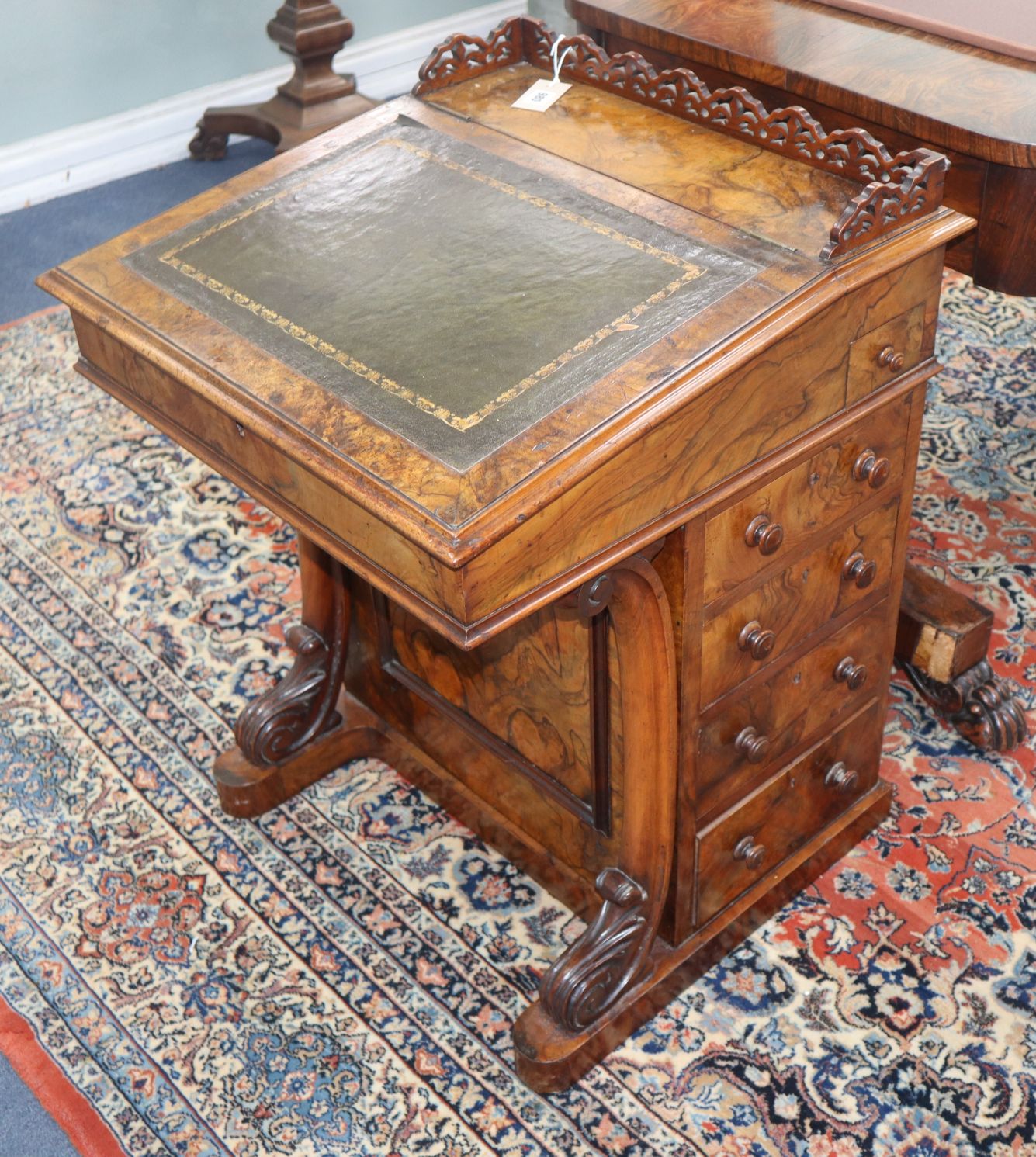 A Victorian walnut Davenport W.56cm