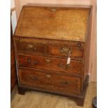 A small George III banded oak bureau, W.80cm