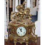 A French gilt metal and marble mantel clock