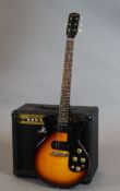 A 1964 Gibson Melody Maker (2 pickups) with original case / case candy