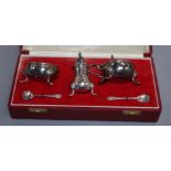 A cased modern silver three piece condiment set, Birmingham, 1971.