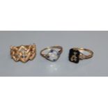 A 9ct gold pierced ring, a sapphire and diamond tablet ring and a signet ring