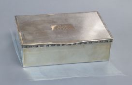 A modern silver cigarette box, by Cooper Brothers & Sons, Sheffield, 1973, 15cm.