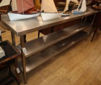 An Industrial design stainless steel three tier table W.218cm