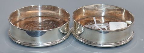 A pair of modern silver wine coasters, London, 1980, 12.8cm.