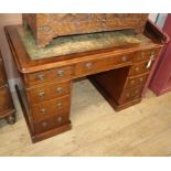 A Victorian mahogany pedestal desk, fitted nine small drawers W.120cm