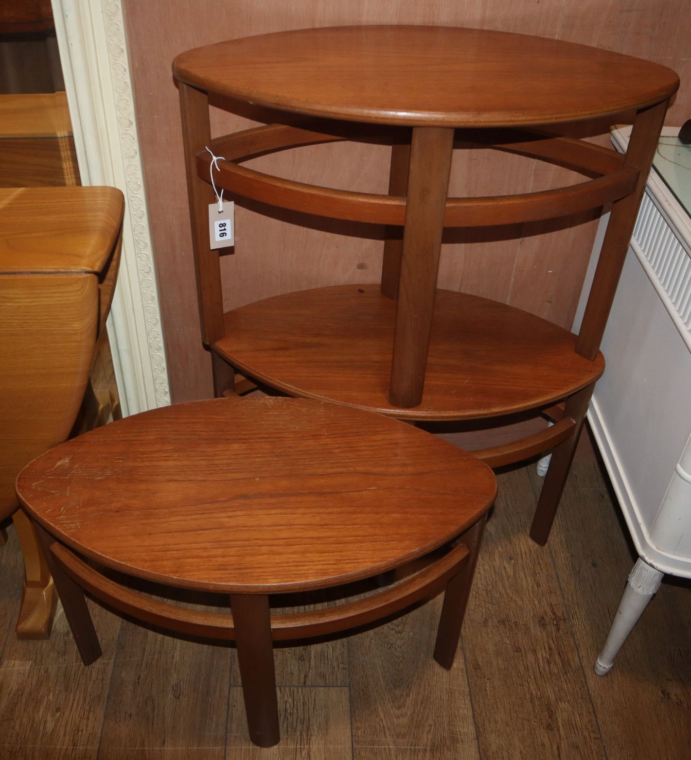 Three 1970's elliptical teak stools W.62cm