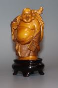 A Japanese stained ivory figure of Budai, boxed