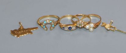 An 18ct gold, sapphire and diamond ring, a pearl ring, a turquoise and pearl gold 'horseshoe' ring