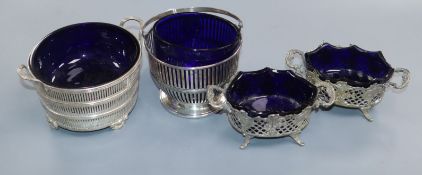 A 1930's pierced silver two handled dish with liner, a silver basket with associated liner and a