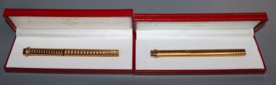 A boxed Cartier fountain pens and ball point pen