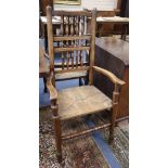 A set of eight Lancashire ash and beech rush seated spindle back dining chairs (two with arms)