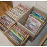 A collection of 1960s 45rpm singles to include Elvis Presley and Marty Robbins