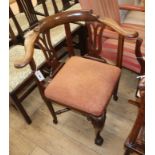 A George II mahogany corner elbow chair