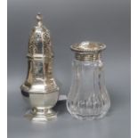 A late Victorian silver octagonal, London, 1890 caster and a German sterling mounted glass sugar