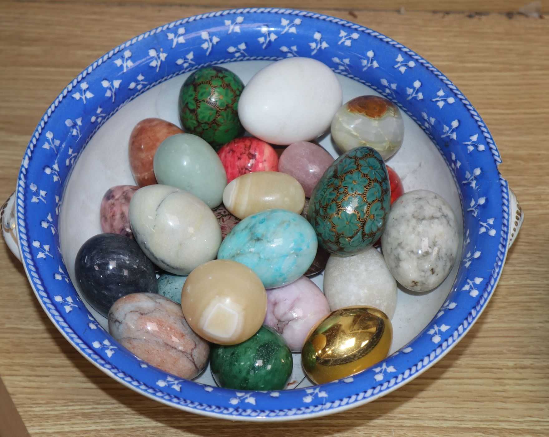 A quantity of hardstone eggs in a bowl