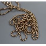 An Edwardian 9ct guard chain, 144cm.