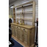 A Victorian stripped pine dresser W.186cm