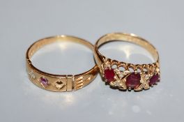 Two early 20th century 18ct gold, ruby and diamond rings (stone missing).