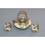 A Japanese Satsuma pottery miniature tea pot and two vases Provenance - The owner and her family