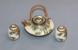 A Japanese Satsuma pottery miniature tea pot and two vases Provenance - The owner and her family