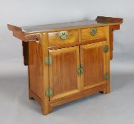 A Chinese padouk wood cabinet W.124cm