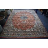 A North West Persian style brick red carpet 342 x 246cm