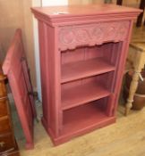 A red painted three shelf bookcase and a wall mounted two door panel (2) cabinet W.68cm