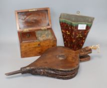 A Victorian walnut domed topped tea caddy, a pair of bellows and a wall pocket