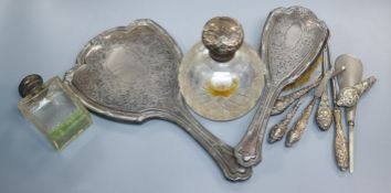 A quantity of silver-handled dressing table items, dressing table pieces.