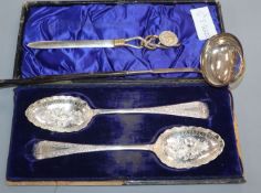 A cased pair of Victorian silver berry spoons, a Georgian toddy ladle and a 925 letter opener.