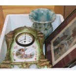 A pottery painted timepiece, a vase and two prints