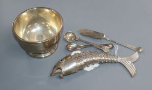 A Mexican white metal reticulated fish, a silver sugar bowl, two silver condiment spoons and a