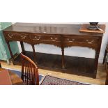 An 18th century oak three drawer potboard low dresser W.182cm